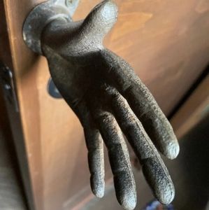 Jewelry hanger. (wall mounted,cast iron, heavy duty hand)